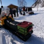 50+ Dawsonites attended near the Yukon River.